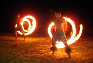 long exposure photograph of Polynesian fire dancers